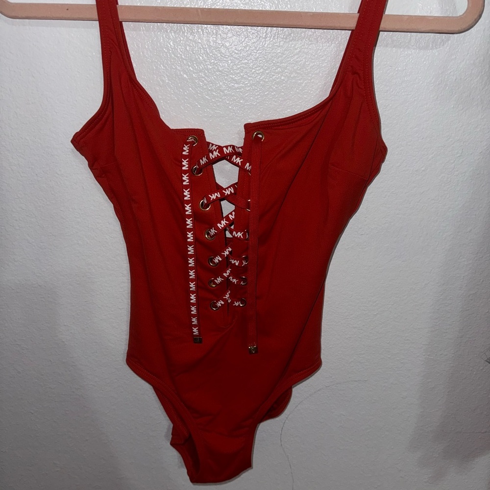 Michael Kors. Swimsuit. Size small. Open back.